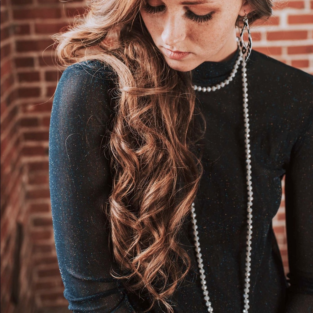 Long strand beaded necklace in light grey
